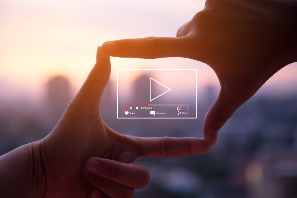 Video marketing hands with icon